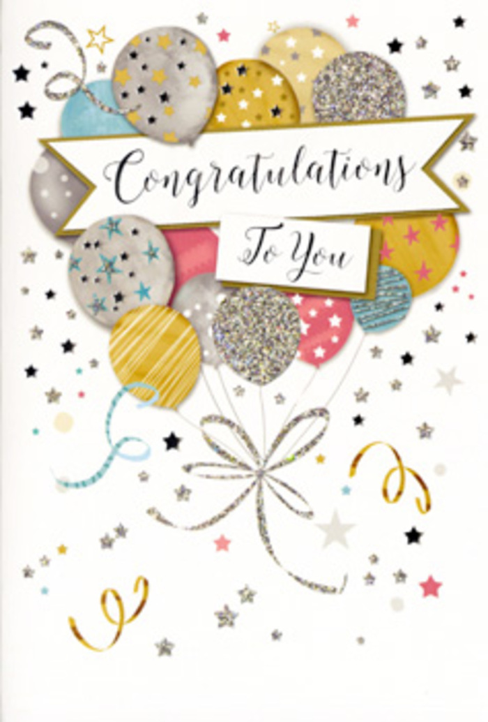 The photograph captures a beautifully designed congratulations card, posed as though it has just been selected to accompany a bouquet for delivery somewhere between Manor House and Finsbury Park. The artwork is dominated by a cheerful composition of balloons gathered in a loose, organic cluster that mimics the shape of a hand-tied floral arrangement. The balloons are rendered in a sophisticated mix of champagne gold, polished silver, soft dove grey, airy sky blue and delicate blush pink, their rounded shapes overlapping to create a sense of depth and gentle upward motion. Each balloon exhibits its own decorative style: some are dusted with glitter-like specks that twinkle across the surface, others feature slim metallic bands encircling them, while a few are adorned with tiny star patterns, reminiscent of the evening sky glimpsed above the rooftops near Green Lanes. From the knot of balloons descend slender strings and curly ribbons illustrated in shimmering gold and silver, looping and twisting with the same playful energy as curling ribbon wound around celebratory bouquets at Flowers Manor House. Stretching across the middle of the design, a softly curved banner bears the words Congratulations To You in flowing, calligraphic script that feels heartfelt and personal. The surrounding background is pale and calm, gently embellished with small metallic stars, swirling flourishes and scattered dots that suggest confetti caught mid-fall, preserving a moment of celebration in stillness. While the card is flat, the interplay of glossy print and suggested glitter invites the imagination to feel subtle texture beneath one's fingertips. The entire scene conveys warmth, accomplishment and joyful elegance, ideal for honouring milestones like exam successes, promotions or personal achievements within the Manor House community.