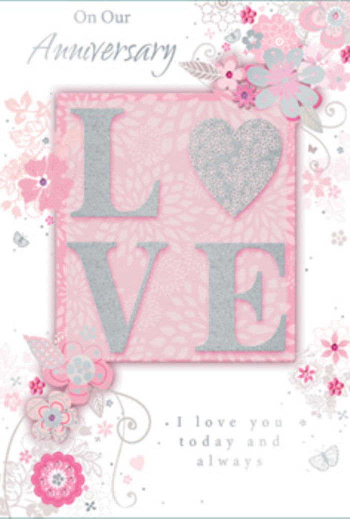 The anniversary card in this photograph feels like a calm, sunlit pause within a busy Manor House day, much like stepping into a quiet café off Green Lanes with someone you love. Its overall colouring is soft and romantic: blush pinks merged with hints of lilac, warm ivory, and a scatter of silver accents that shimmer gently. Dominating the centre, the word LOVE is printed in raised, frosted glitter, catching the light in a way that suggests both sparkle and softness. The tactile nature of the lettering seems designed to be touched, echoing the sensation of brushing against layered petals in a freshly arranged bouquet. Around this phrase, hand-drawn blooms and airy sprays drift along the borders. Their shapes are graceful and slightly whimsical-petals, buds, and leaves stretching outward in slender arcs-coloured in pink, lilac, and ivory tones that blend like watercolours on textured paper. Intertwined among the florals are fine flourishes and filigree-style lines, with tiny, almost-hidden butterflies peeking from the curves, suggesting the light flutter of hearts on a special anniversary morning. In the midst of this gentle artwork sits the message, I love you today and always, rendered in modest, flowing type that feels honest and unforced. The design is spacious, allowing the floral motifs to breathe, as if air and light were circulating through them like a fresh breeze along the paths of Finsbury Park. Overall, the card comes across as a paper bouquet-subtle, deeply affectionate, and perfectly suited to accompany fresh anniversary flowers delivered around Manor House to honour love that is steady, enduring, and quietly radiant.